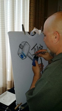 fester airbrushing at party